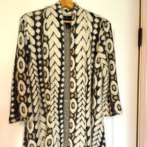 Frank Lyman snake pattern sweater.
